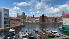 Apartamenty Centrum nad Motławą z widokiem na rzekę lub na patio z balkonem, Gdansk